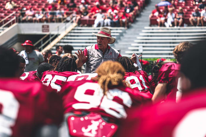 Nick Saban talks to the Crimson Tide after the scrimmage on April 15, 2023